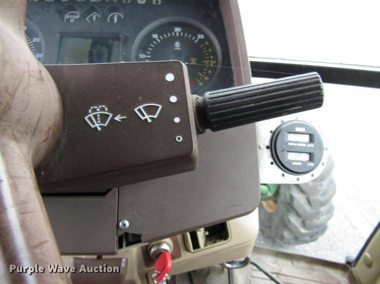 image for item DE5900 2001 John Deere 6410 MFWD tractor