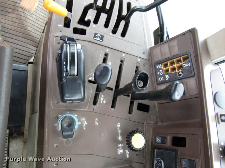 image for item DE5900 2001 John Deere 6410 MFWD tractor