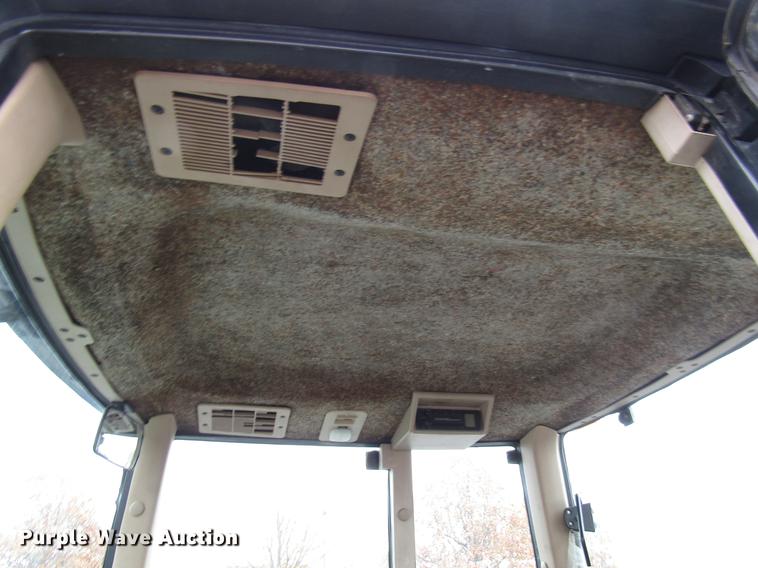 image for item DE5900 2001 John Deere 6410 MFWD tractor