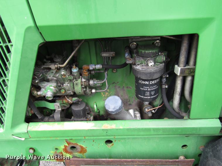 image for item DE5900 2001 John Deere 6410 MFWD tractor