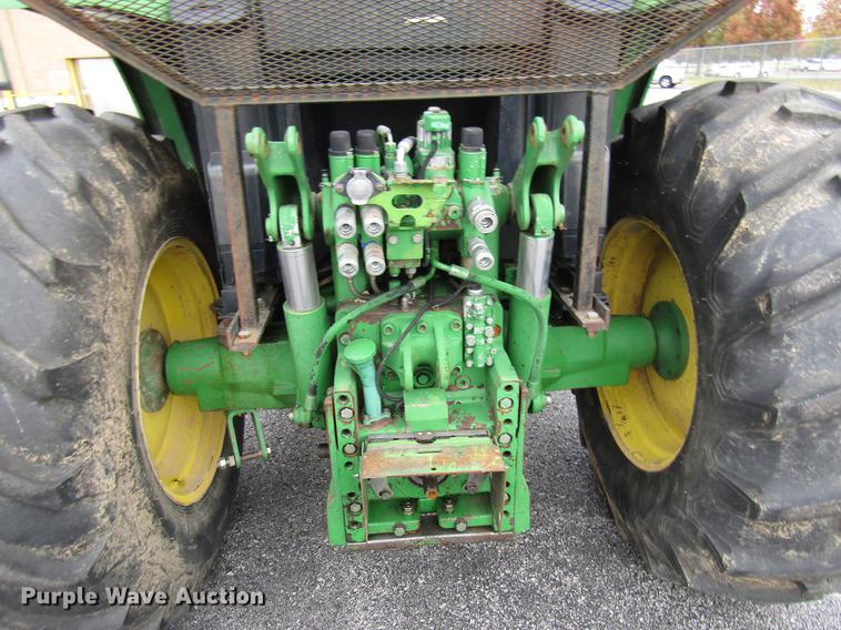 image for item DE5900 2001 John Deere 6410 MFWD tractor