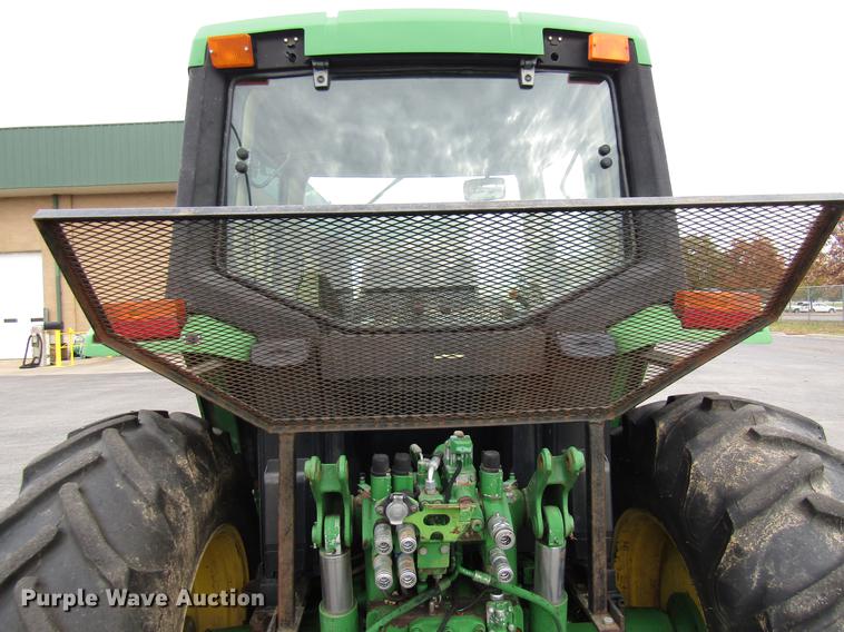 image for item DE5900 2001 John Deere 6410 MFWD tractor