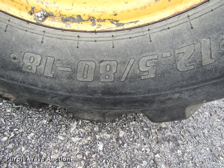 image for item DE5900 2001 John Deere 6410 MFWD tractor