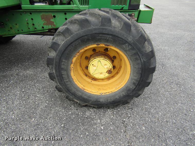 image for item DE5900 2001 John Deere 6410 MFWD tractor