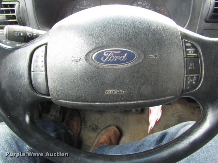 image for item DE5916 2006 Ford F450 Super Duty Crew Cab dump truck