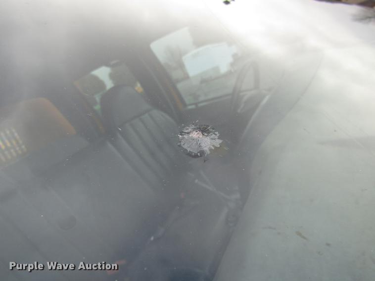 image for item DE5916 2006 Ford F450 Super Duty Crew Cab dump truck