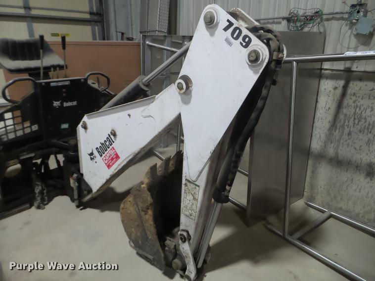 image for item DX9615 Bobcat 709 skid steer backhoe