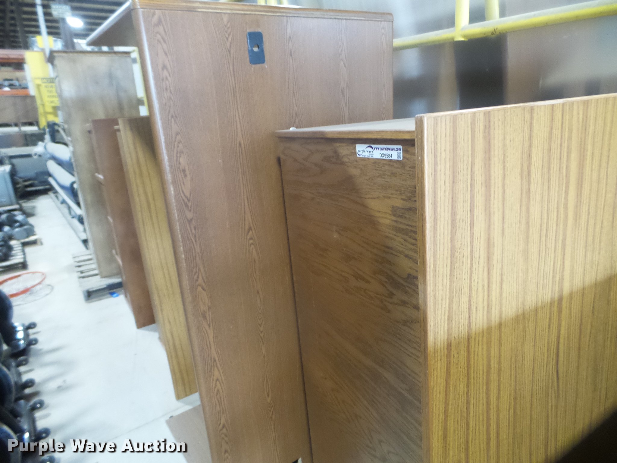 (3) wood desks in Des Moines, IA Item DX9584 sold Purple Wave