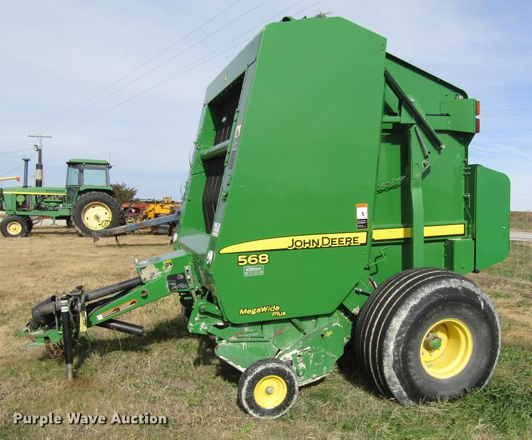 image for item DB4823 2011 John Deere 568 round baler