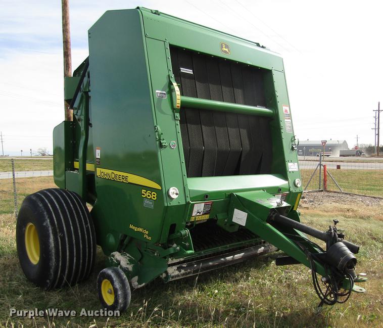 image for item DB4823 2011 John Deere 568 round baler