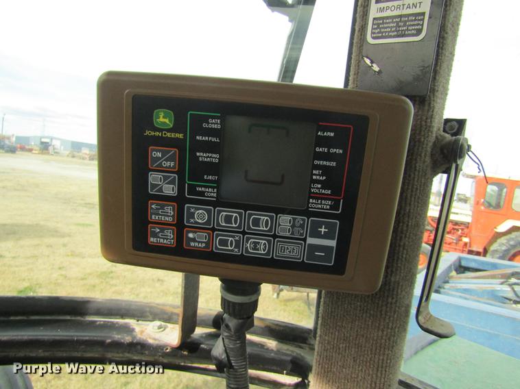 image for item DB4823 2011 John Deere 568 round baler