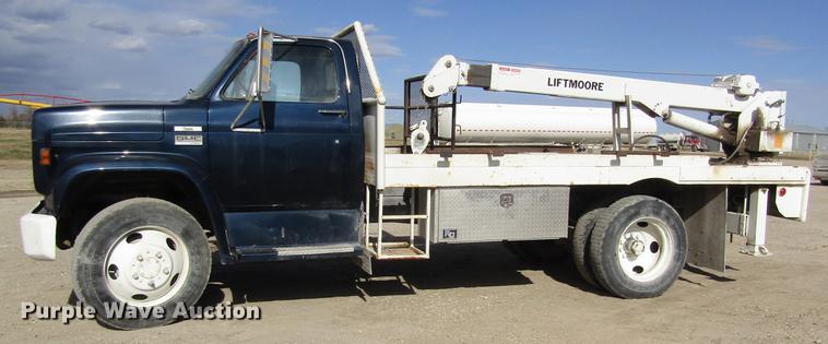 image for item DB4885 1977 GMC 6000 flatbed truck with crane