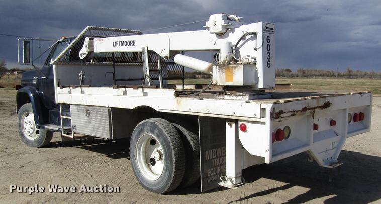 image for item DB4885 1977 GMC 6000 flatbed truck with crane