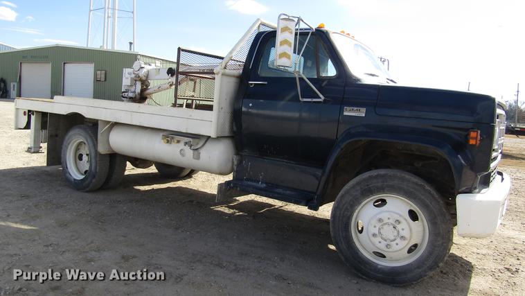 image for item DB4885 1977 GMC 6000 flatbed truck with crane
