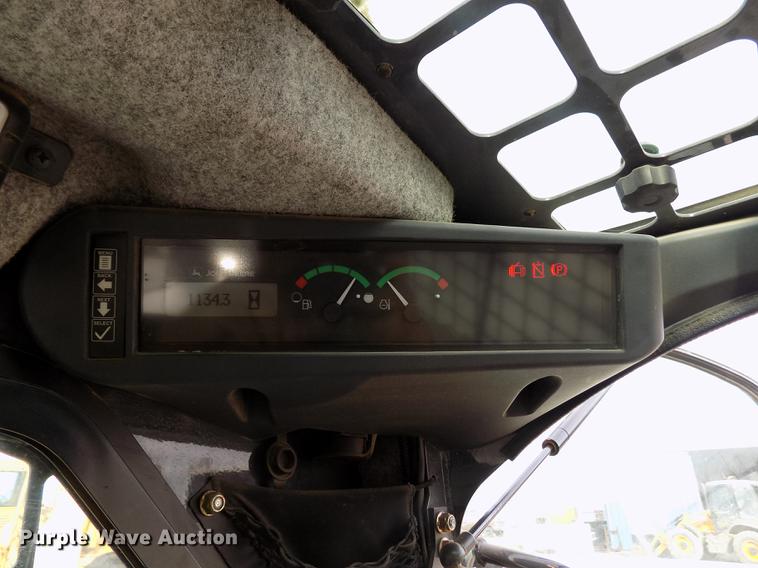 image for item DB9033 2012 John Deere 328D skid steer