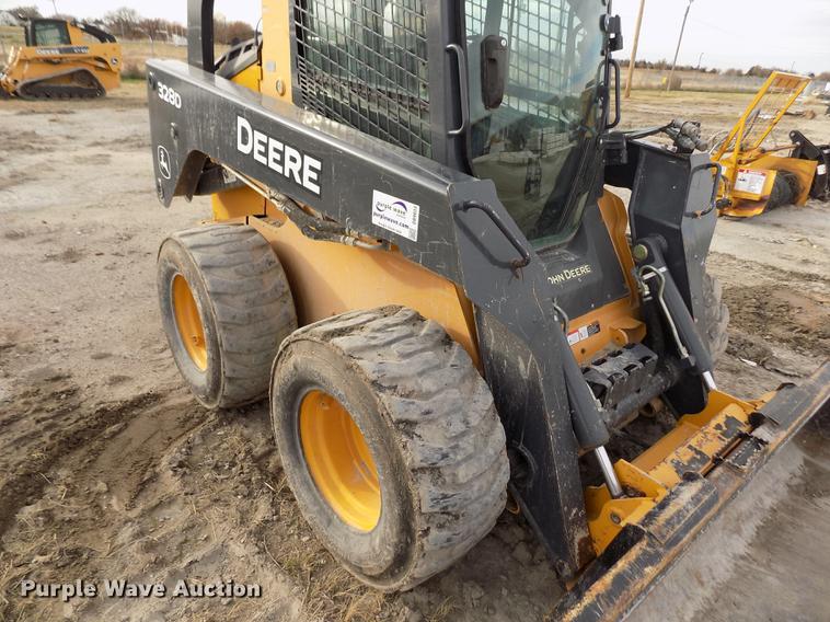 image for item DB9033 2012 John Deere 328D skid steer