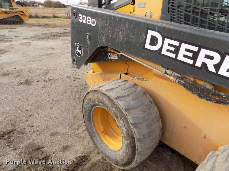 image for item DB9033 2012 John Deere 328D skid steer