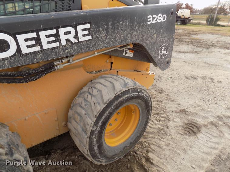 image for item DB9033 2012 John Deere 328D skid steer