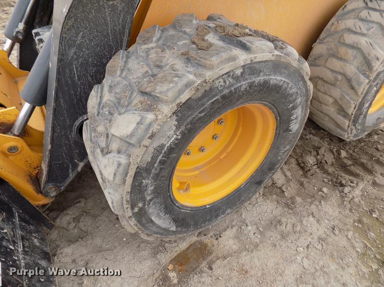 image for item DB9033 2012 John Deere 328D skid steer