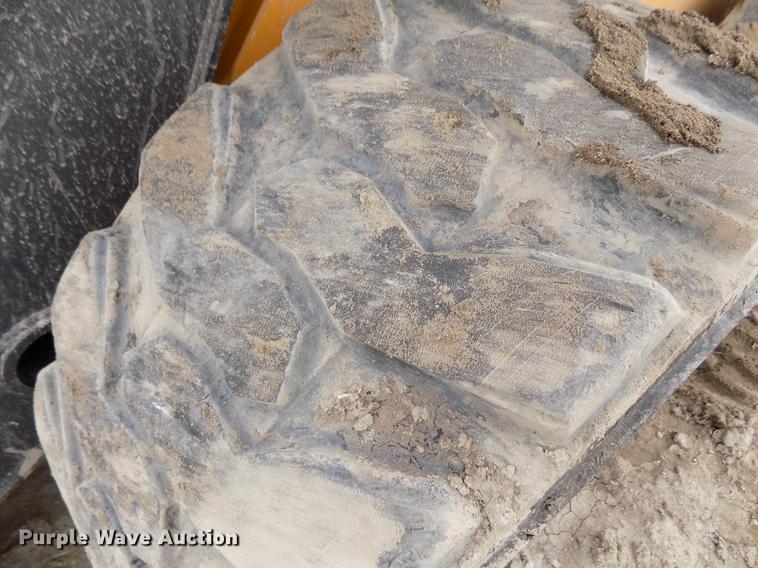 image for item DB9033 2012 John Deere 328D skid steer