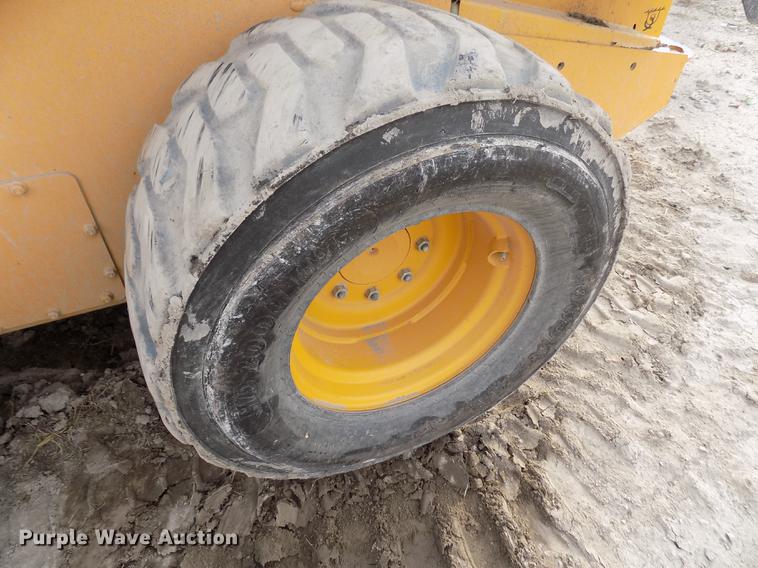 image for item DB9033 2012 John Deere 328D skid steer