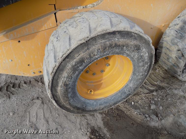 image for item DB9033 2012 John Deere 328D skid steer