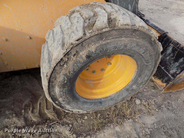 image for item DB9033 2012 John Deere 328D skid steer