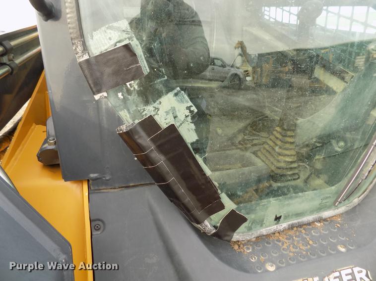 image for item DB9034 2010 John Deere 326D skid steer