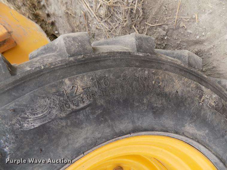 image for item DB9034 2010 John Deere 326D skid steer