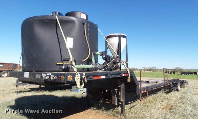 image for item EN9668 2006 XL Specialized 7050 drop deck sprayer trailer