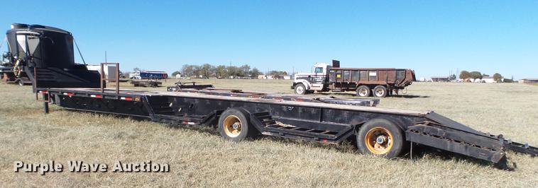 image for item EN9668 2006 XL Specialized 7050 drop deck sprayer trailer