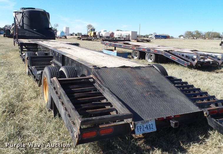 image for item EN9668 2006 XL Specialized 7050 drop deck sprayer trailer