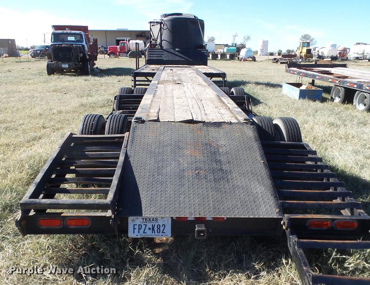 image for item EN9668 2006 XL Specialized 7050 drop deck sprayer trailer