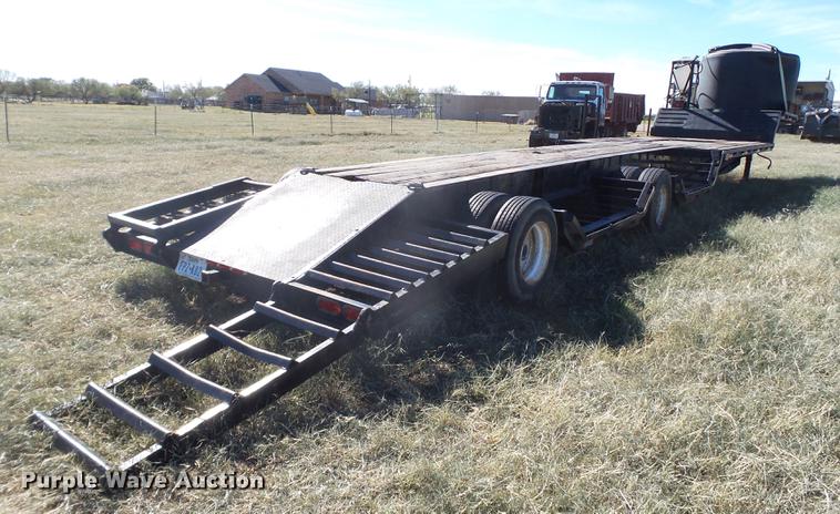 image for item EN9668 2006 XL Specialized 7050 drop deck sprayer trailer