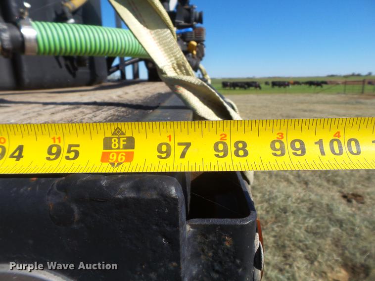 image for item EN9668 2006 XL Specialized 7050 drop deck sprayer trailer