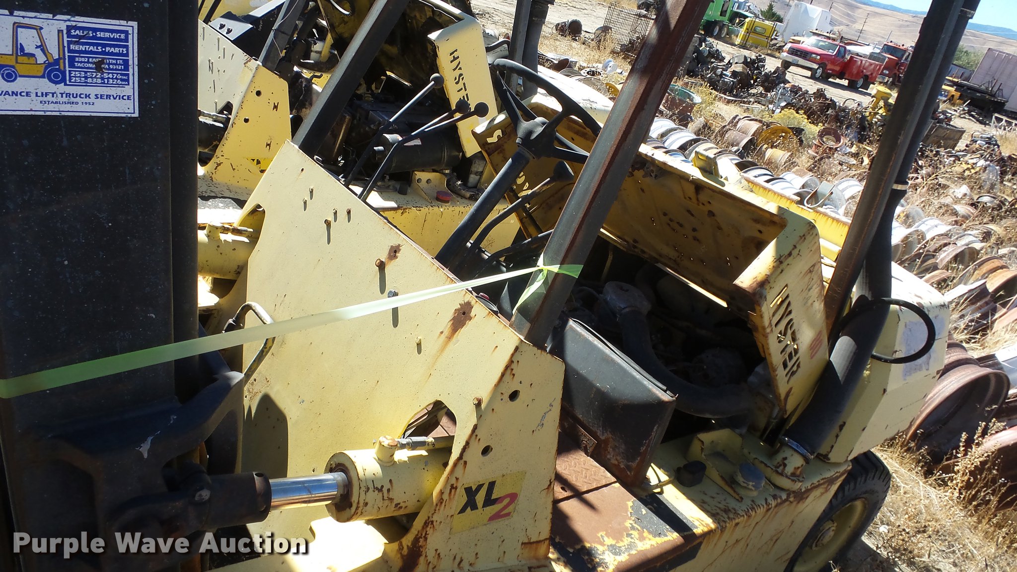 (3) salvage forklifts in Reno, NV Item FS9779 sold Purple Wave