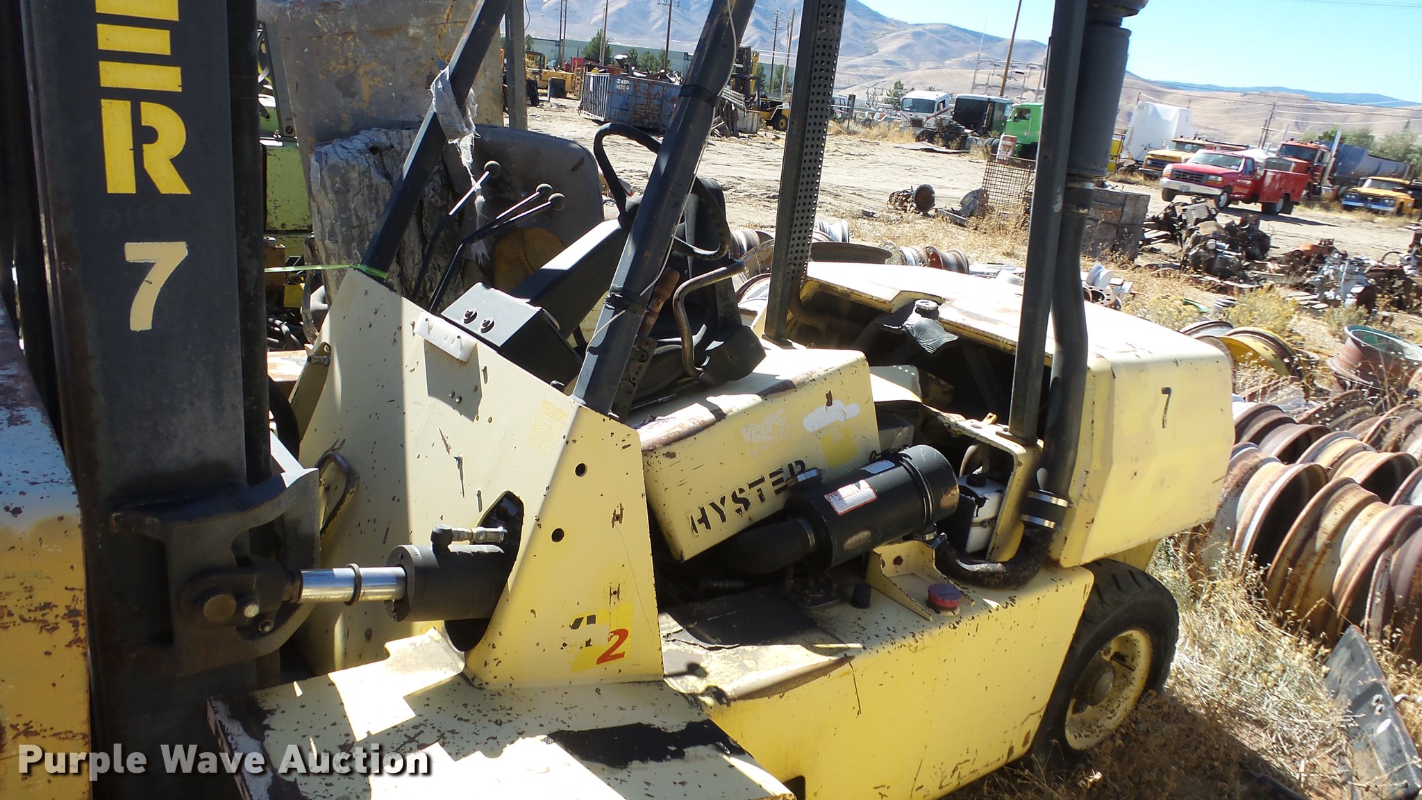 (3) salvage forklifts in Reno, NV Item FS9779 sold Purple Wave
