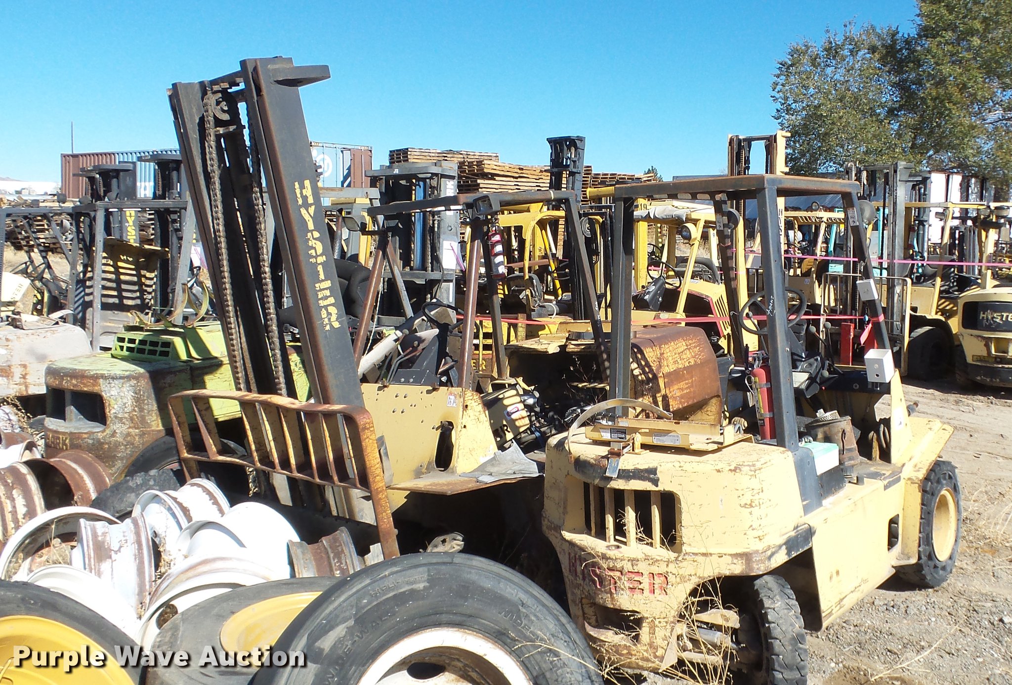 (4) salvage forklifts in Reno, NV Item FS9796 sold Purple Wave
