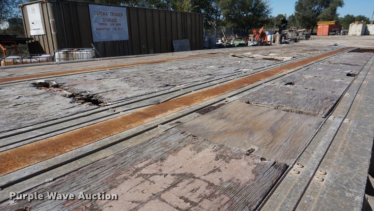 image for item DD6657 1997 Fontaine LFTW-5-10048WSAWE flatbed trailer