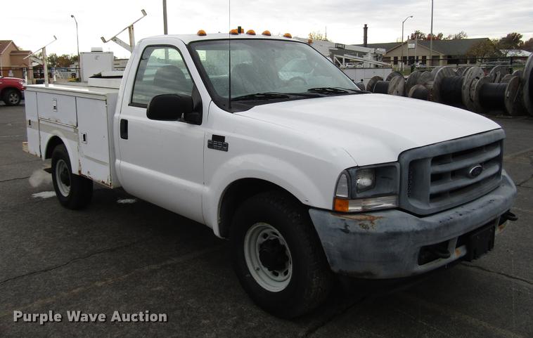 image for item DD3805 2003 Ford F250 Super Duty utility bed pickup truck