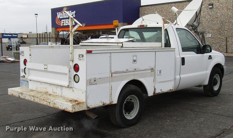 image for item DD3805 2003 Ford F250 Super Duty utility bed pickup truck