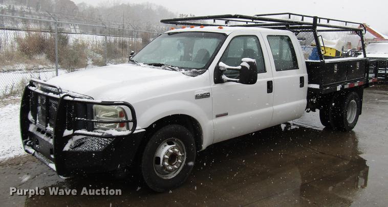 image for item DD3825 2007 Ford F350 Super Duty Crew Cab flatbed pickup truck