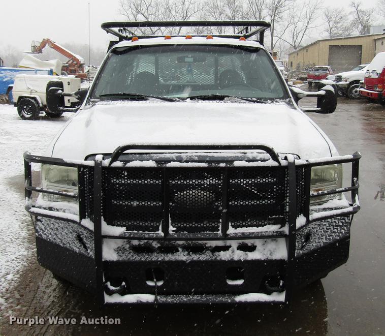 image for item DD3825 2007 Ford F350 Super Duty Crew Cab flatbed pickup truck