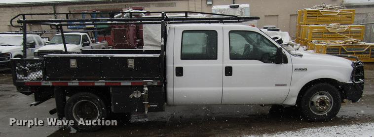 image for item DD3825 2007 Ford F350 Super Duty Crew Cab flatbed pickup truck
