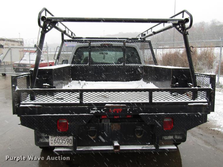 image for item DD3825 2007 Ford F350 Super Duty Crew Cab flatbed pickup truck