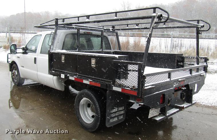 image for item DD3825 2007 Ford F350 Super Duty Crew Cab flatbed pickup truck