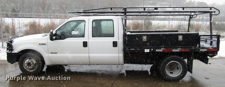 image for item DD3825 2007 Ford F350 Super Duty Crew Cab flatbed pickup truck