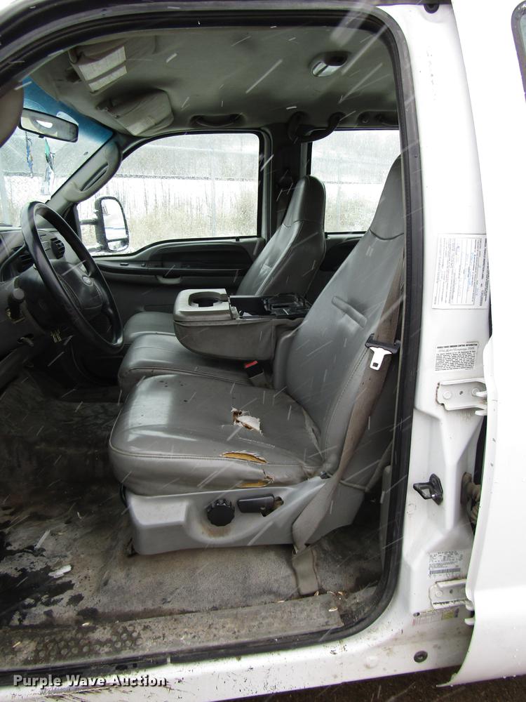 image for item DD3825 2007 Ford F350 Super Duty Crew Cab flatbed pickup truck