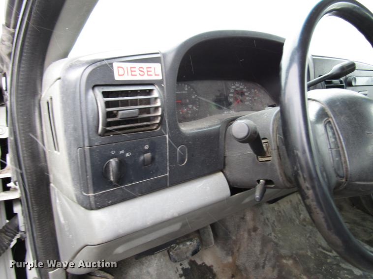 image for item DD3825 2007 Ford F350 Super Duty Crew Cab flatbed pickup truck