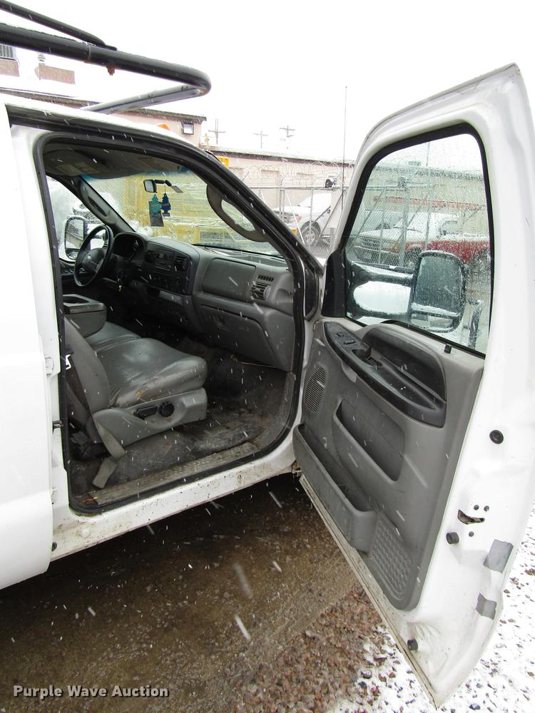 image for item DD3825 2007 Ford F350 Super Duty Crew Cab flatbed pickup truck